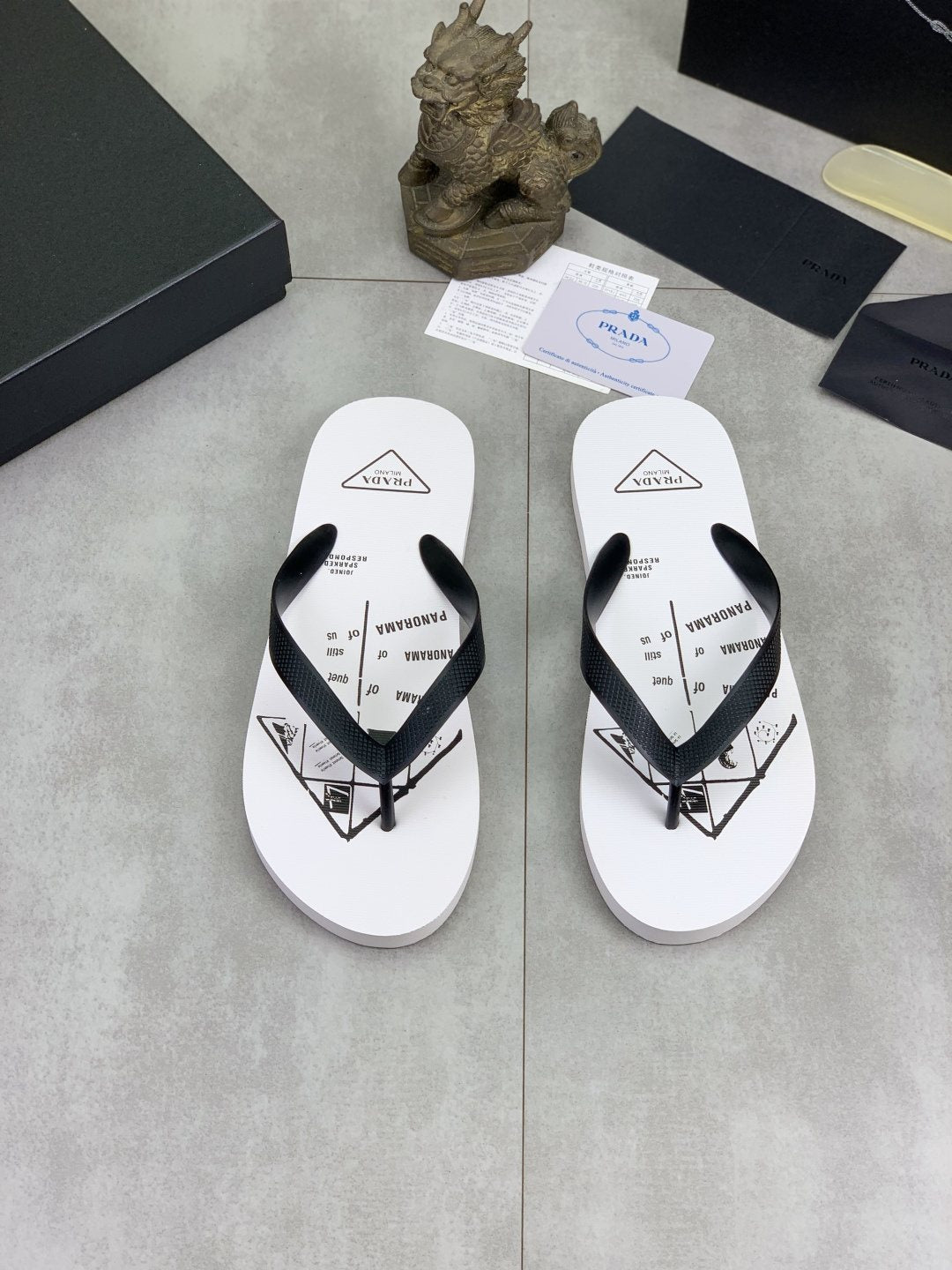 Prada Black Strap White Flip Flops